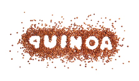 Word QUINOA written with red seeds on white background, top view