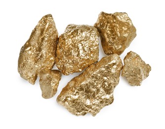 Photo of Many gold nuggets on white background, top view