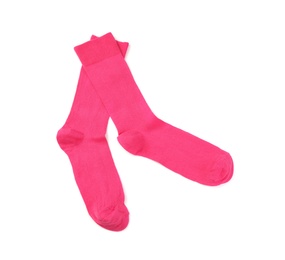 Photo of Pink socks on white background, top view