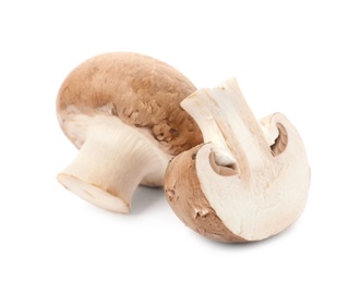 Photo of Fresh raw champignon mushrooms on white background