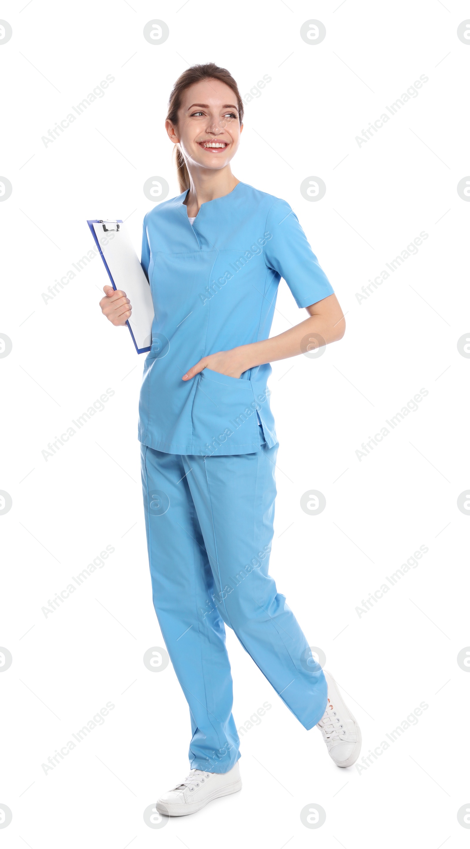 Photo of Full length portrait of medical doctor with clipboard isolated on white