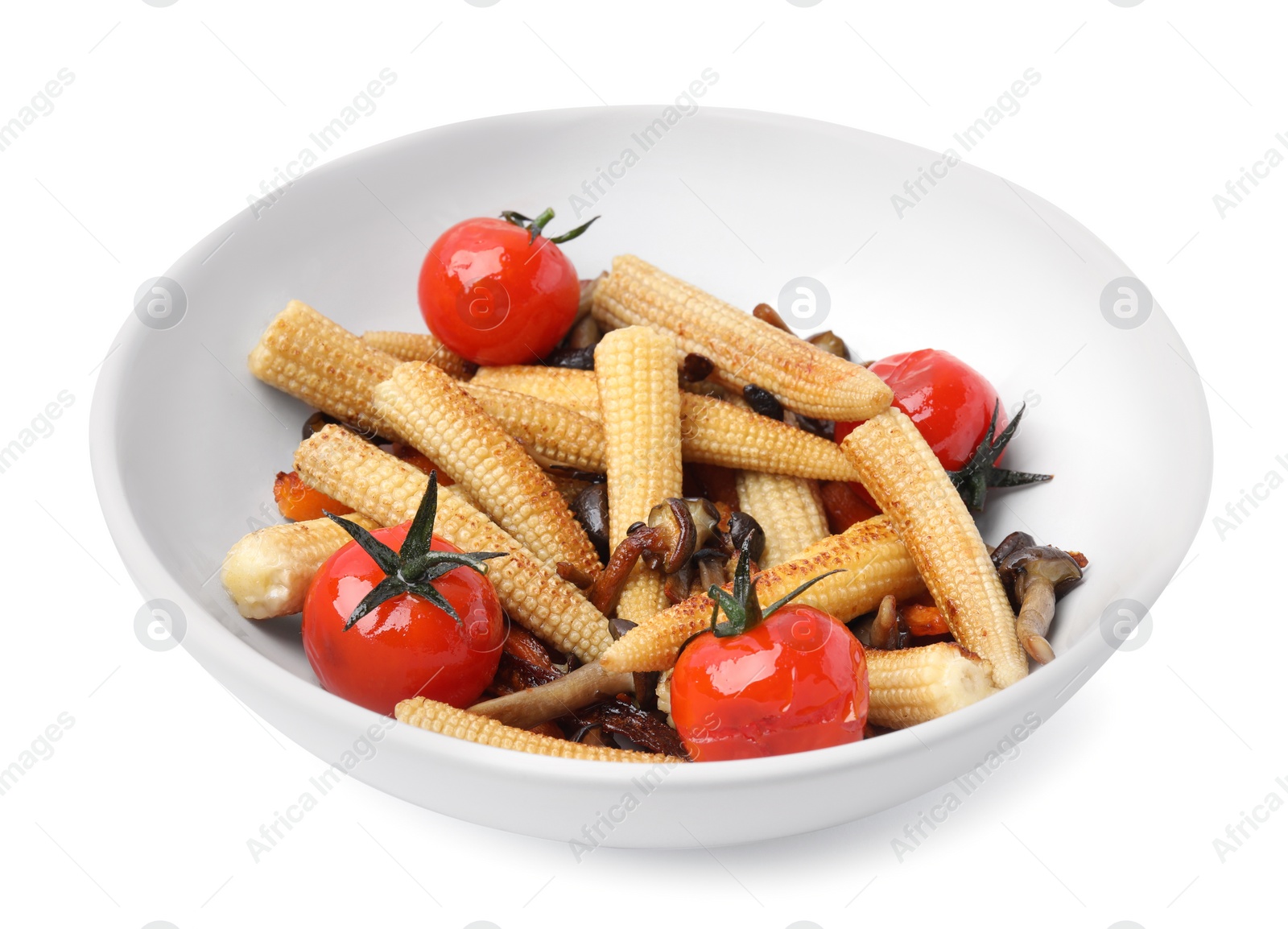 Photo of Tasty roasted baby corn with tomatoes and mushrooms isolated on white