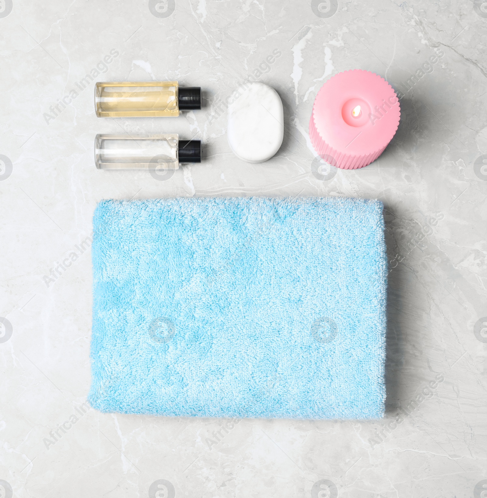 Photo of Flat lay composition with spa accessories on light background