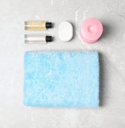 Flat lay composition with spa accessories on light background