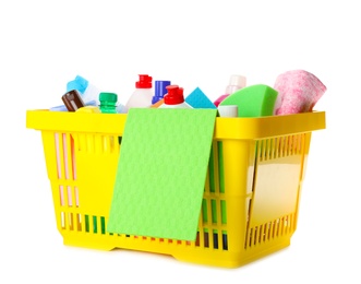 Photo of Yellow shopping basket with different household chemicals on white background