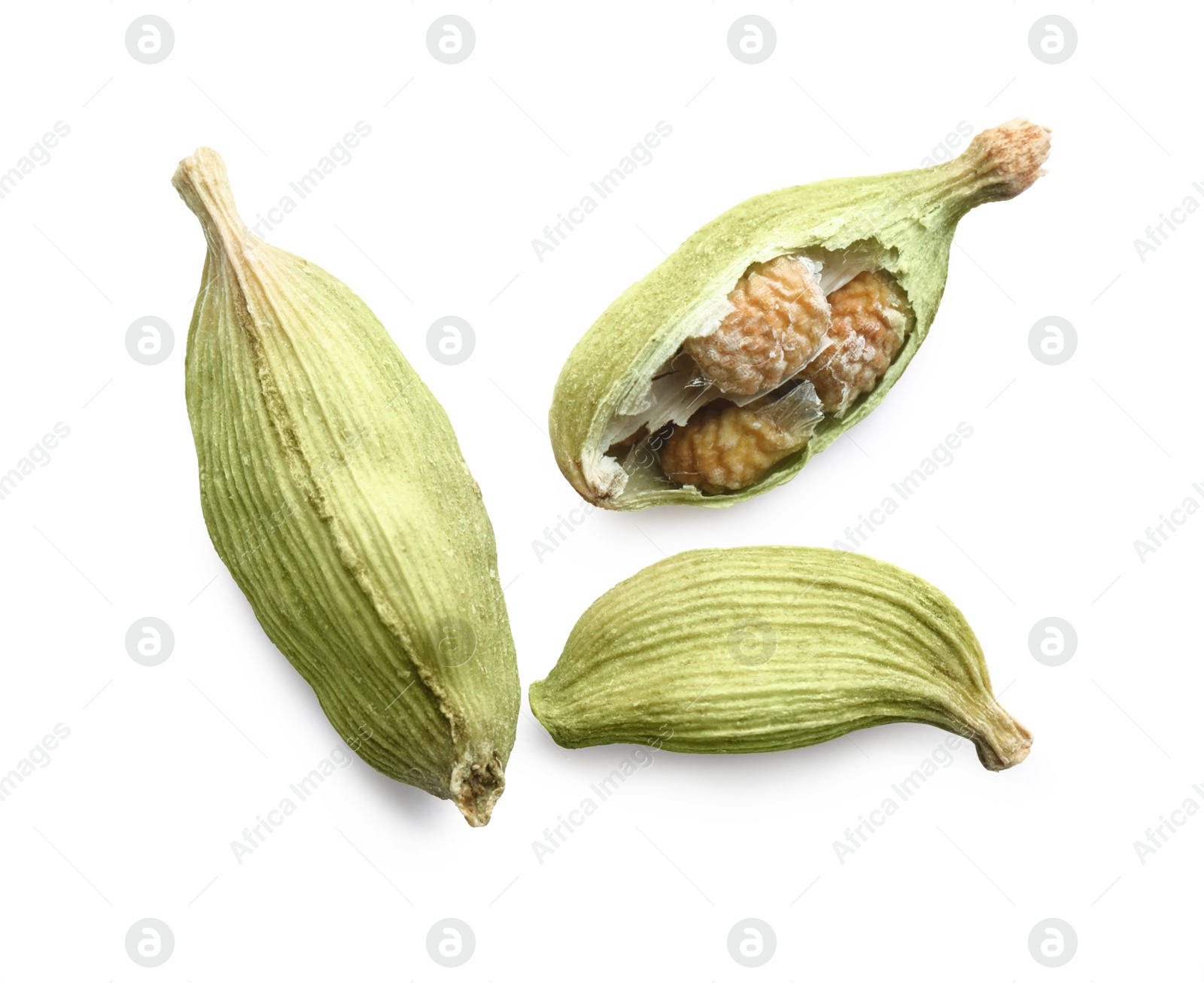 Photo of Dry green cardamom pods on white background, top view