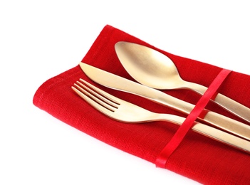 Photo of Napkin with golden cutlery on white background, closeup