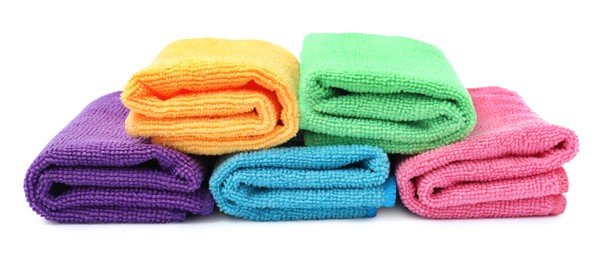 Many colorful microfiber cloths on white background