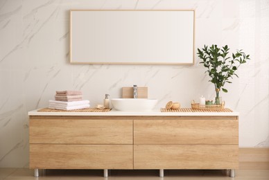 Photo of Modern bathroom interior with stylish mirror and vessel sink