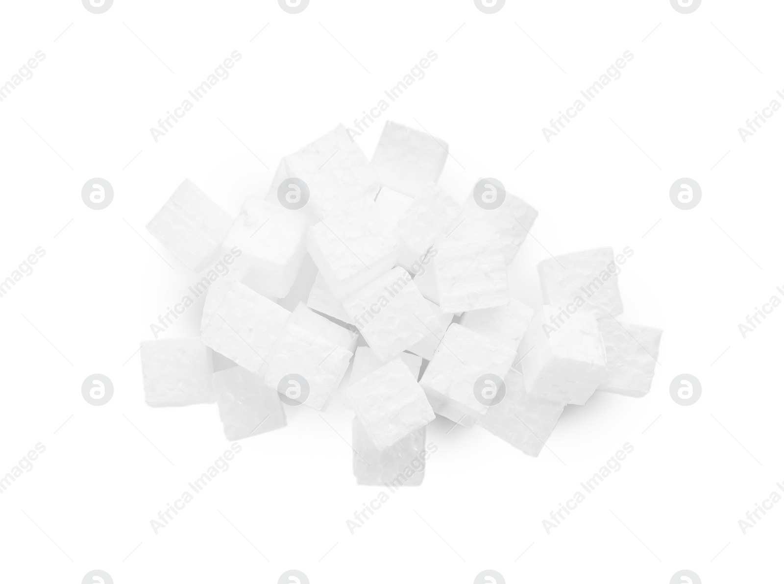 Photo of Pile of styrofoam cubes on white background, top view