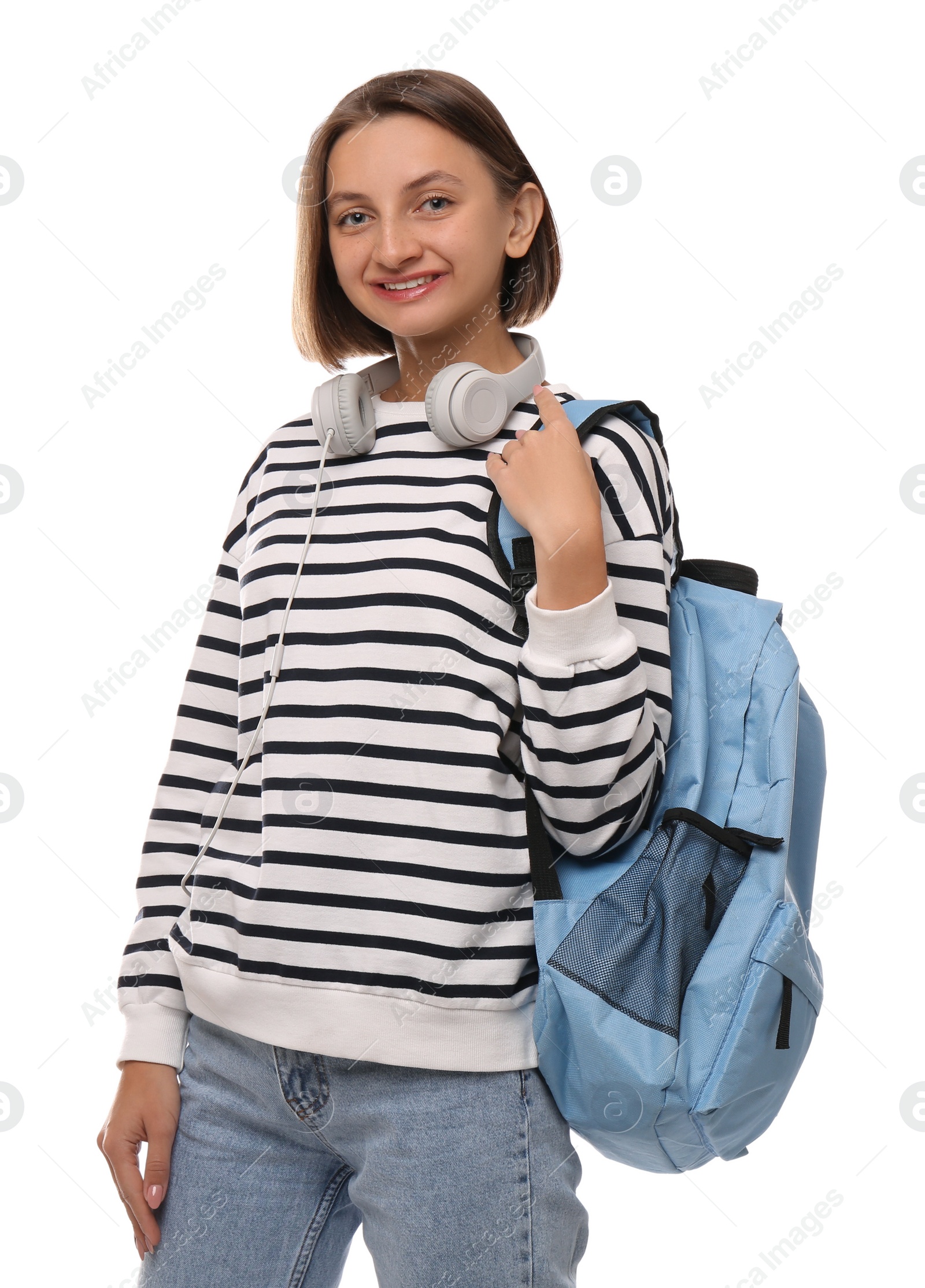 Photo of Young student with backpack and headphones on white background