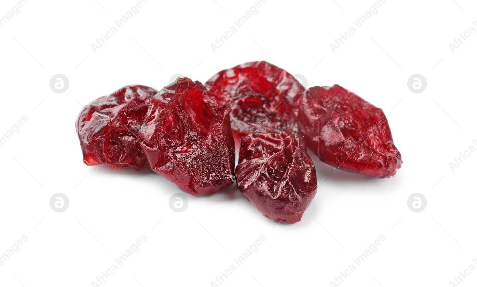 Photo of Dried cranberries isolated on white. Tasty berries