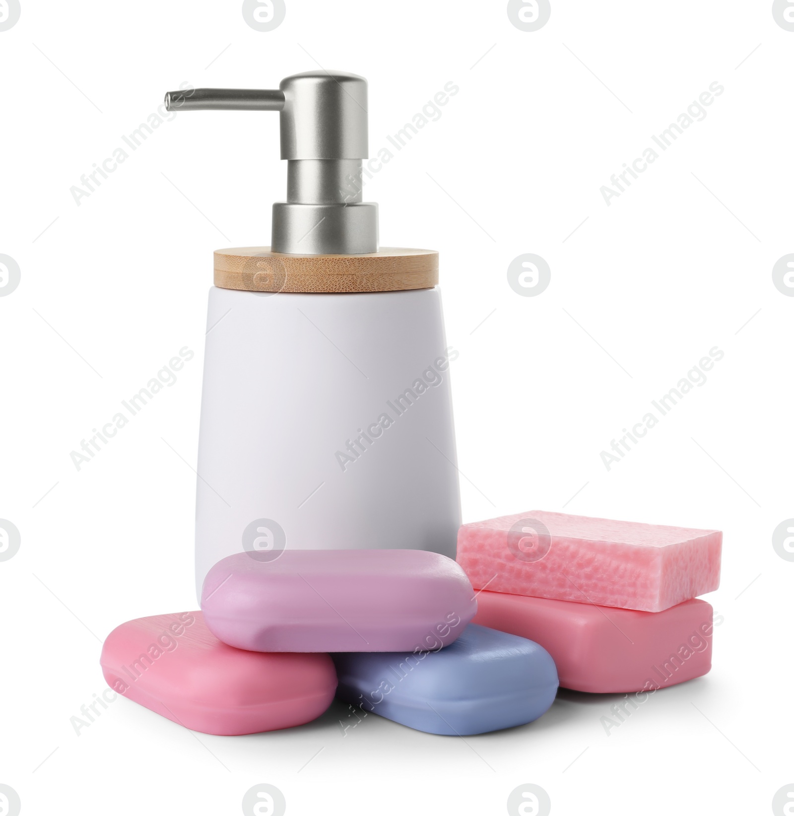 Photo of Soap bars and dispenser on white background