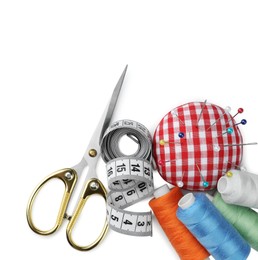 Set of different sewing accessories on white background, top view
