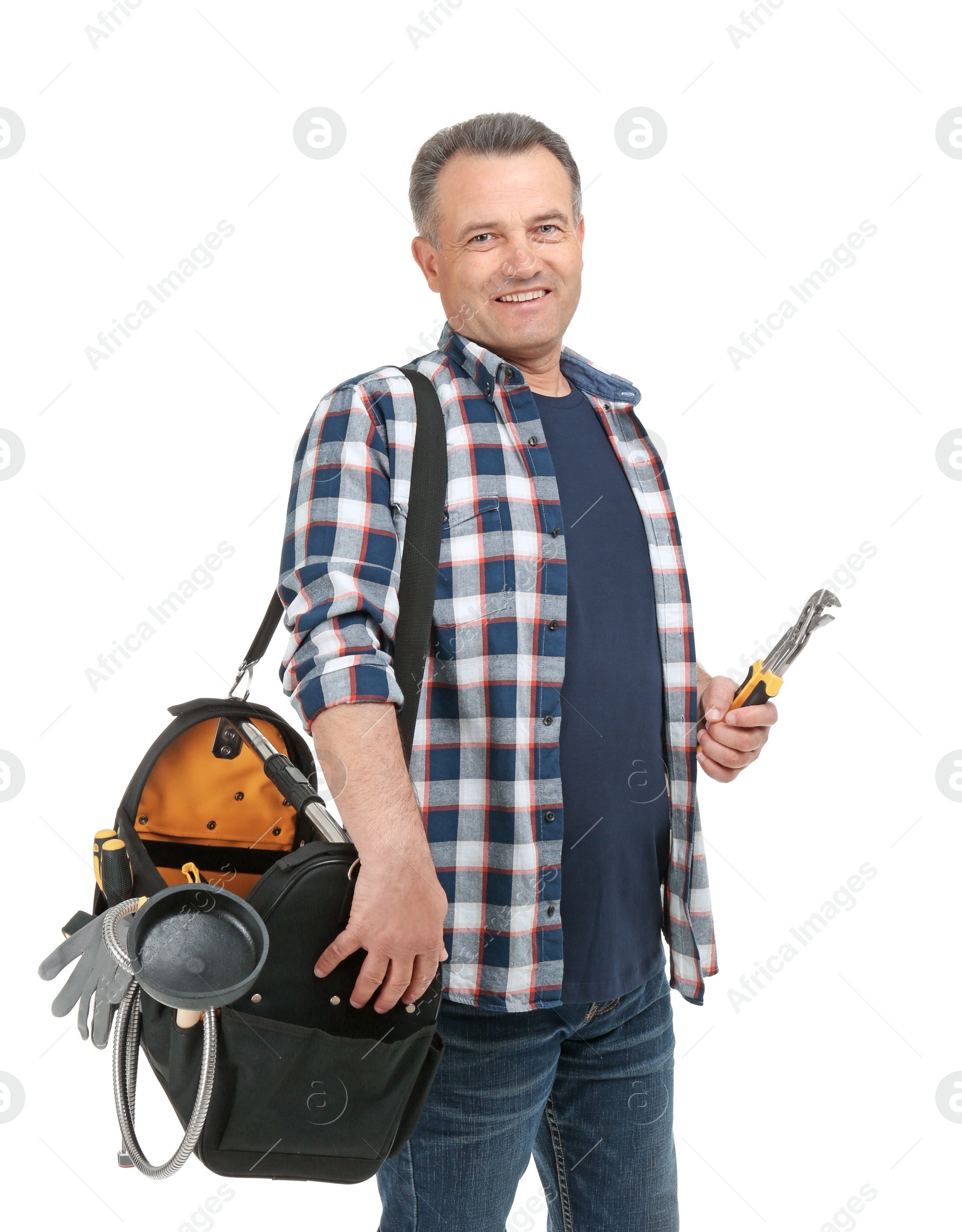 Photo of Mature plumber with tool bag on white background