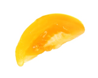 Photo of Slice of yellow tomato on white background