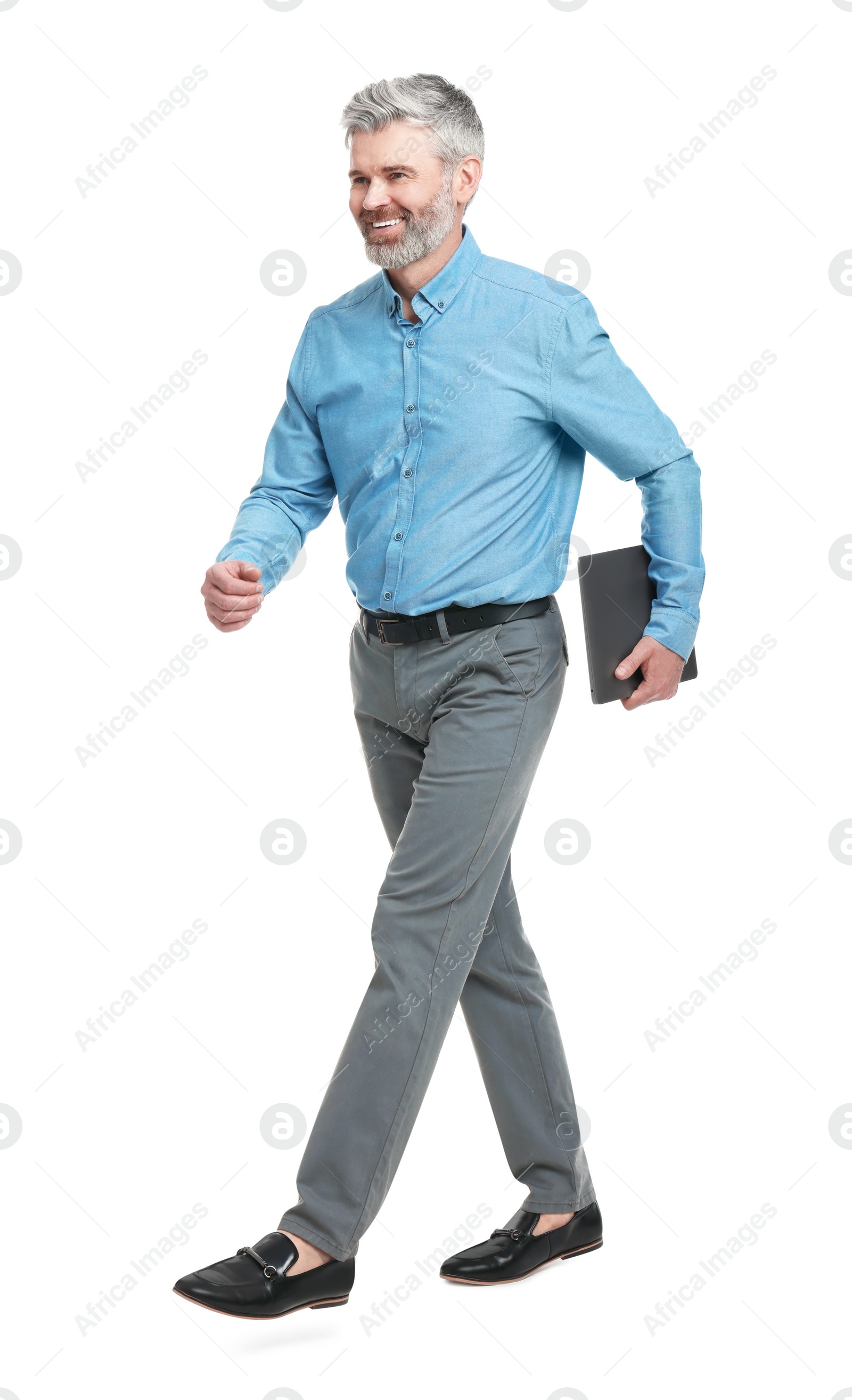 Photo of Mature businessman in stylish clothes with laptop on white background