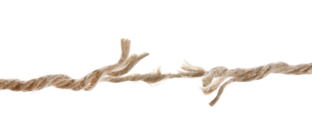 Frayed rope at breaking point on white background