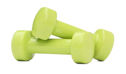 Photo of Light green dumbbells isolated on white. Sports equipment