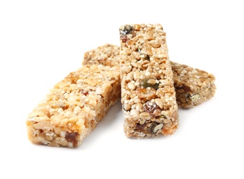 Photo of Different grain cereal bars on white background. Healthy snack