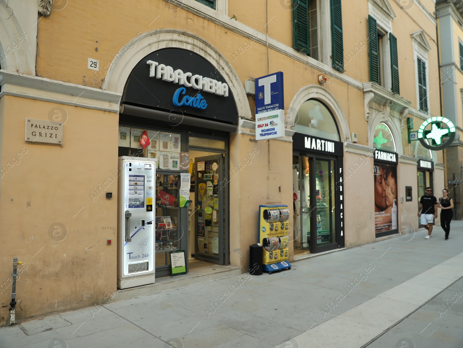 Photo of JESI, ITALY - MAY 17, 2022: Modern tobacco shop on city street