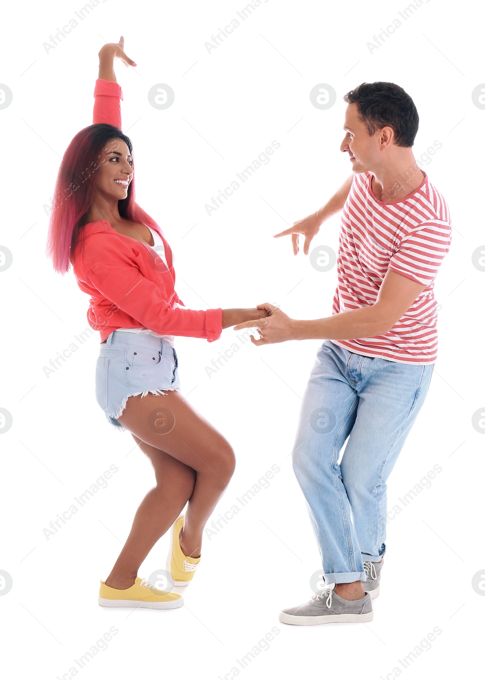 Photo of Beautiful lovely couple dancing on white background