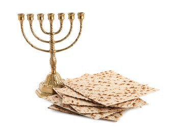 Photo of Passover matzos and Menorah isolated on white. Pesach celebration