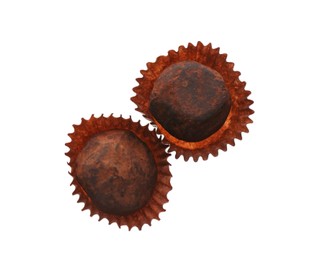 Photo of Delicious chocolate candies on white background, top view