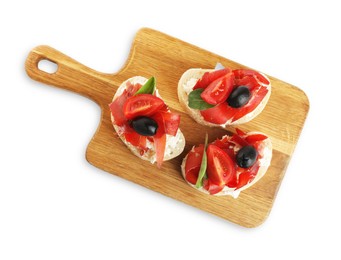 Photo of Delicious sandwiches with bresaola, cream cheese, olives and tomato isolated on white, top view