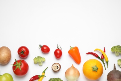 Flat lay composition with fresh vegetables on white background. Space for text