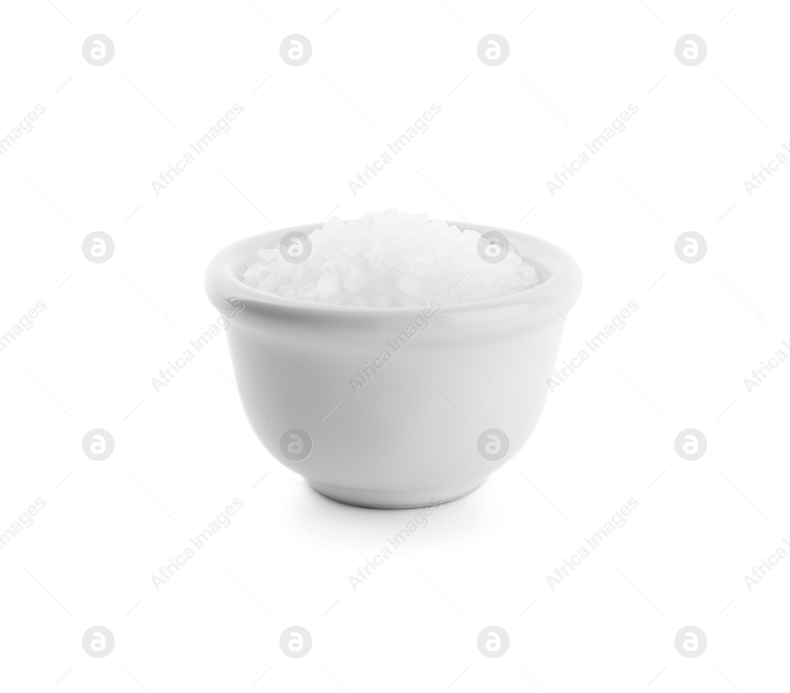 Photo of Natural salt in bowl isolated on white