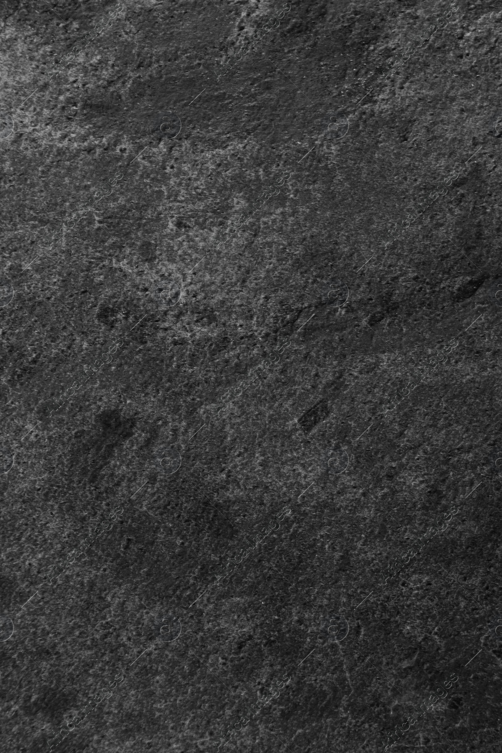 Image of Texture of dark grey stone surface as background, closeup