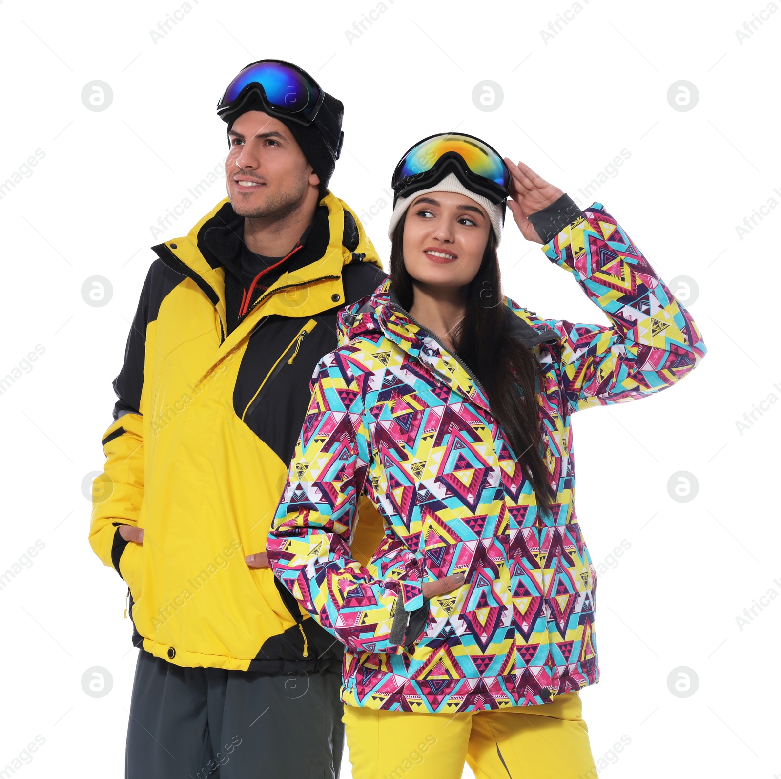 Photo of Couple wearing stylish winter sport clothes on white background