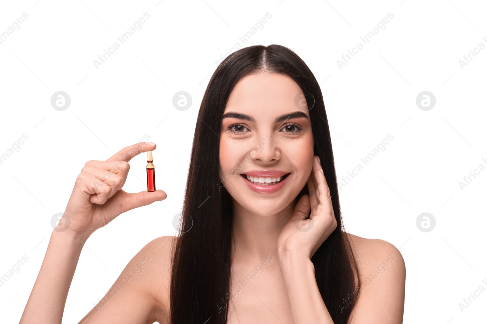 Photo of Beautiful young woman holding skincare ampoule on white background