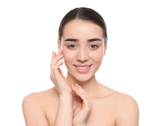 Portrait of young woman with beautiful face against white background