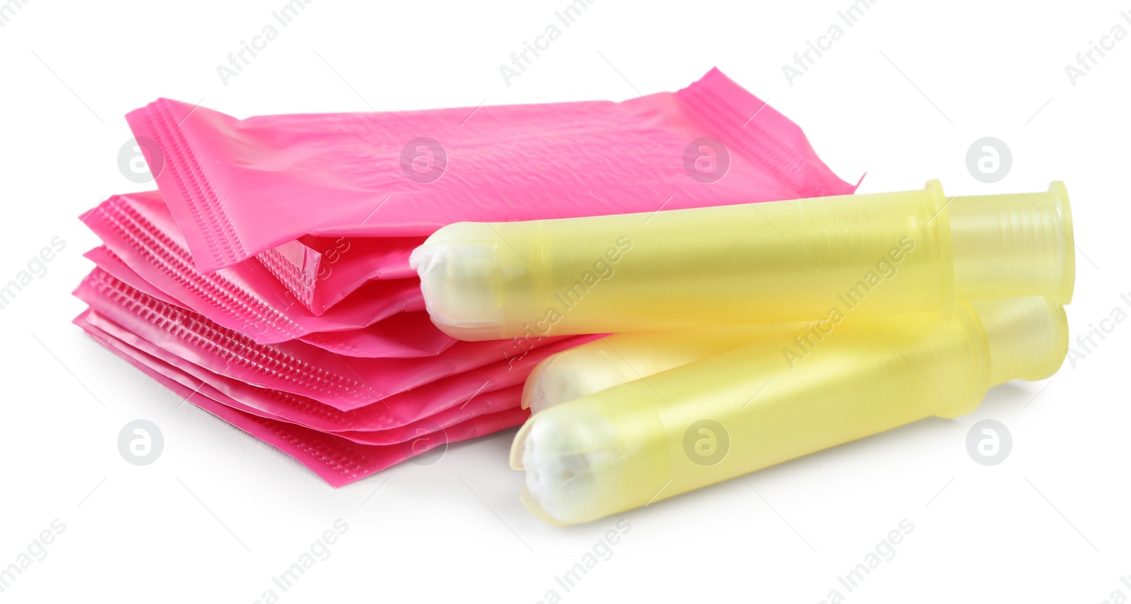 Photo of Pads and tampons on white background. Menstrual hygiene product