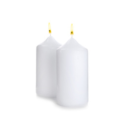 Wax candles with wicks isolated on white