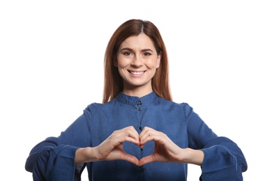 Photo of Woman showing HEART gesture in sign language on white background