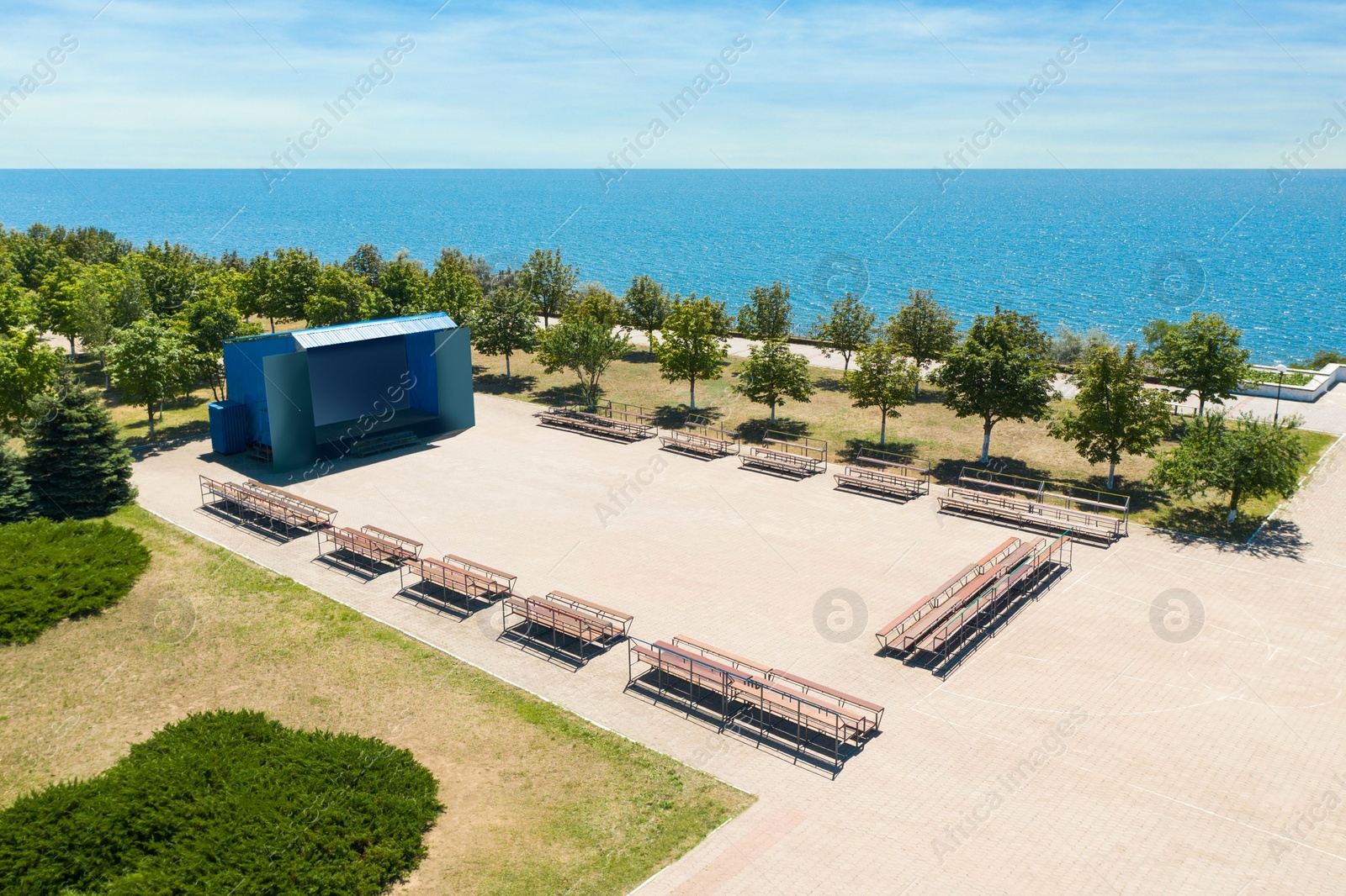 Image of Outdoor cinema and entertainment place near sea on sunny day 