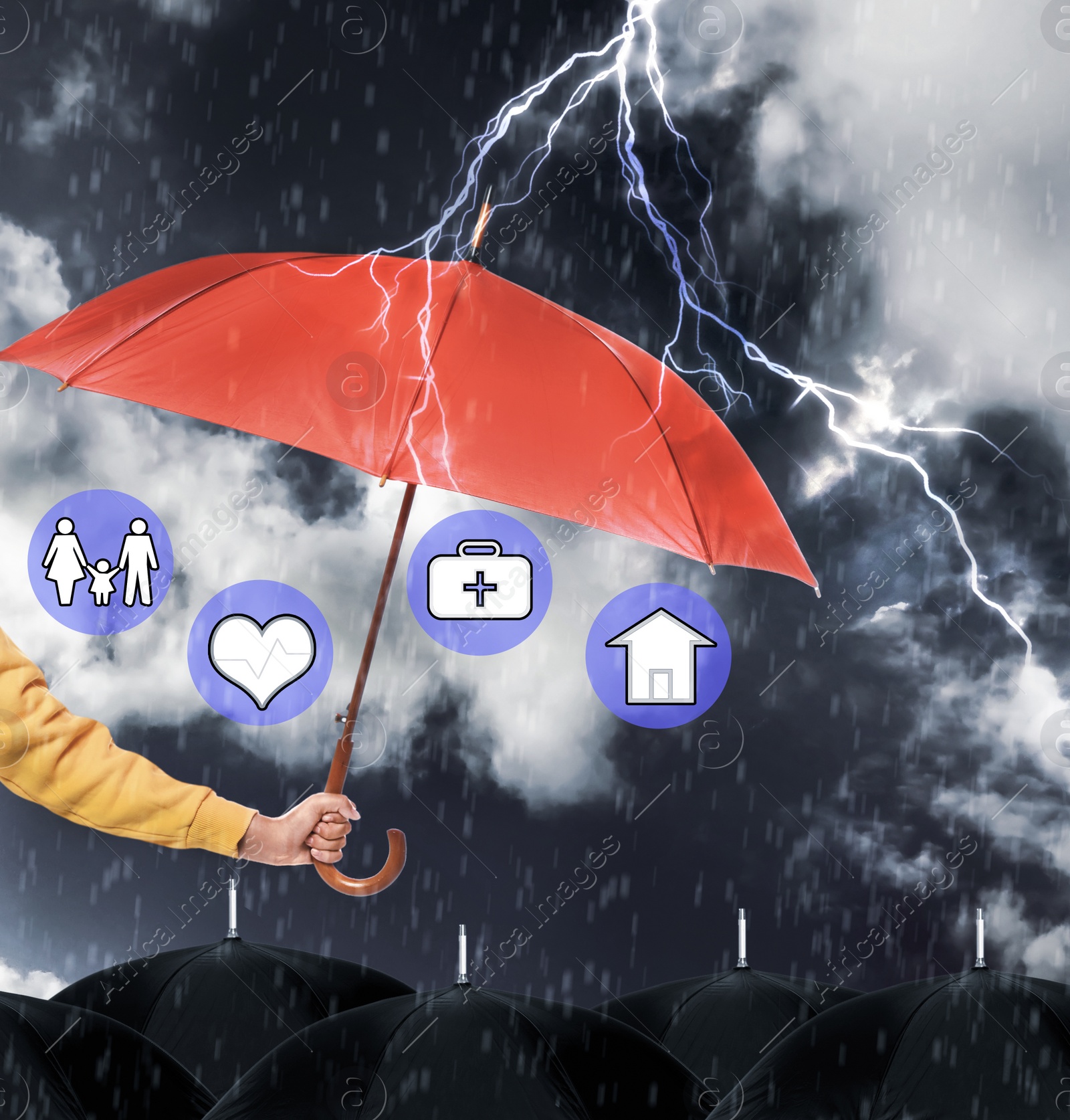 Image of Insurance agent covering illustrations with red umbrella during storm