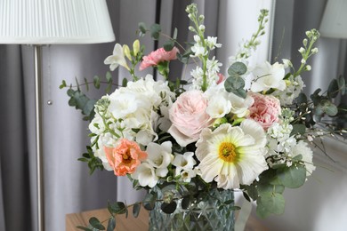 Photo of Beautiful bouquet of different fresh flowers indoors, closeup