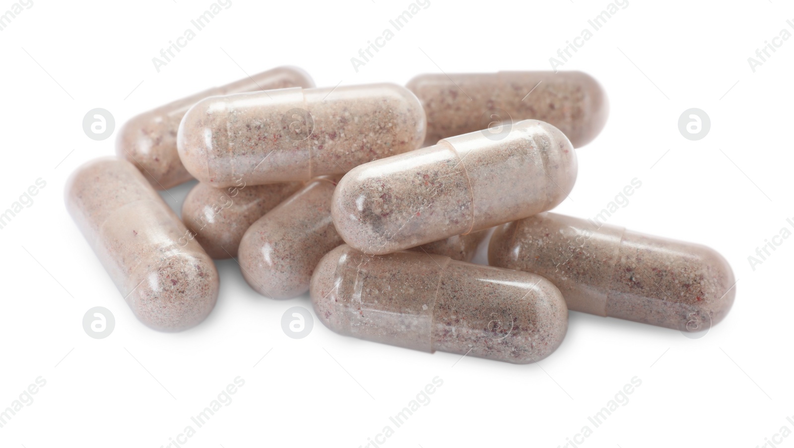 Photo of Many transparent gelatin capsules on white background