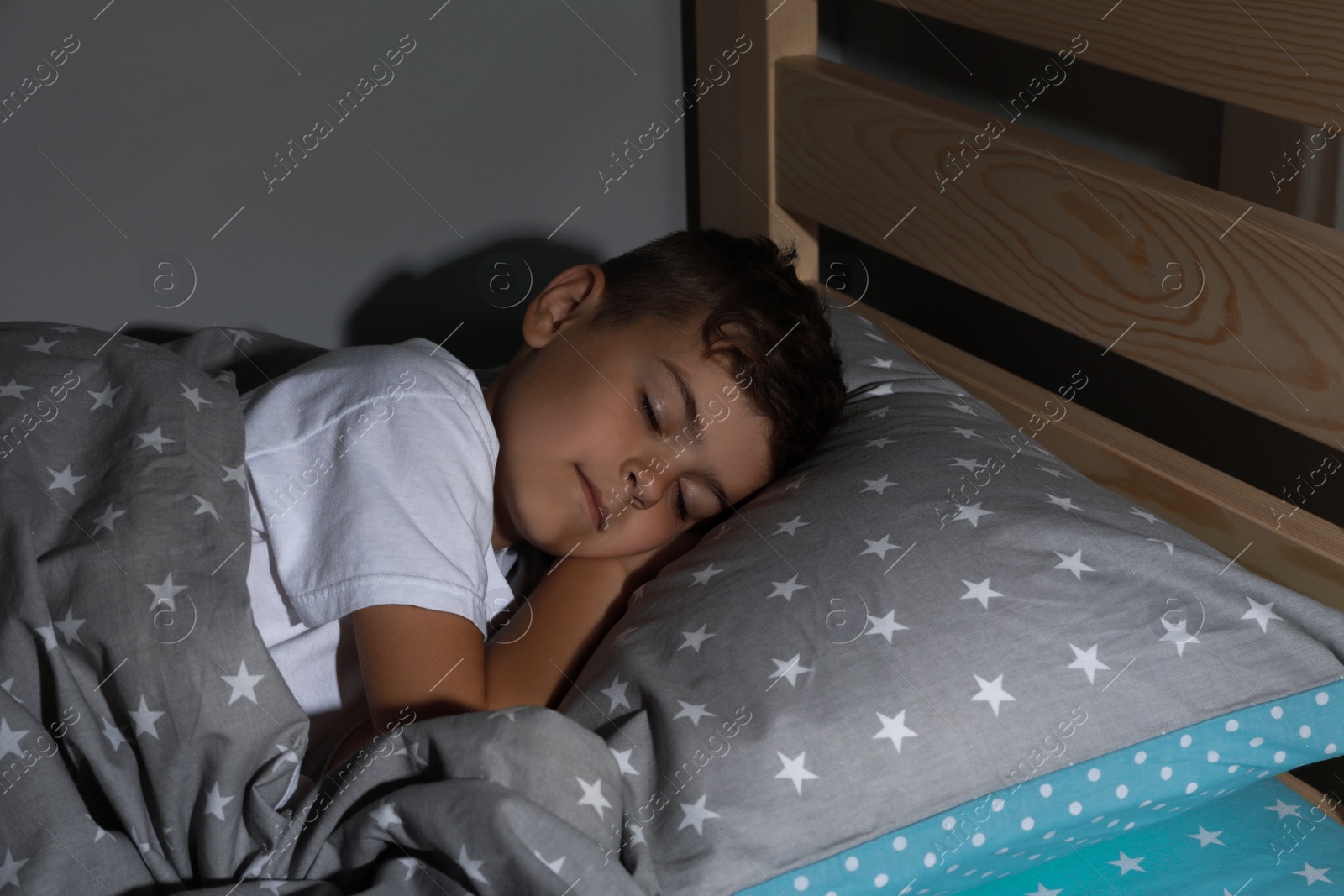Photo of Cute little boy sleeping at home. Bedtime