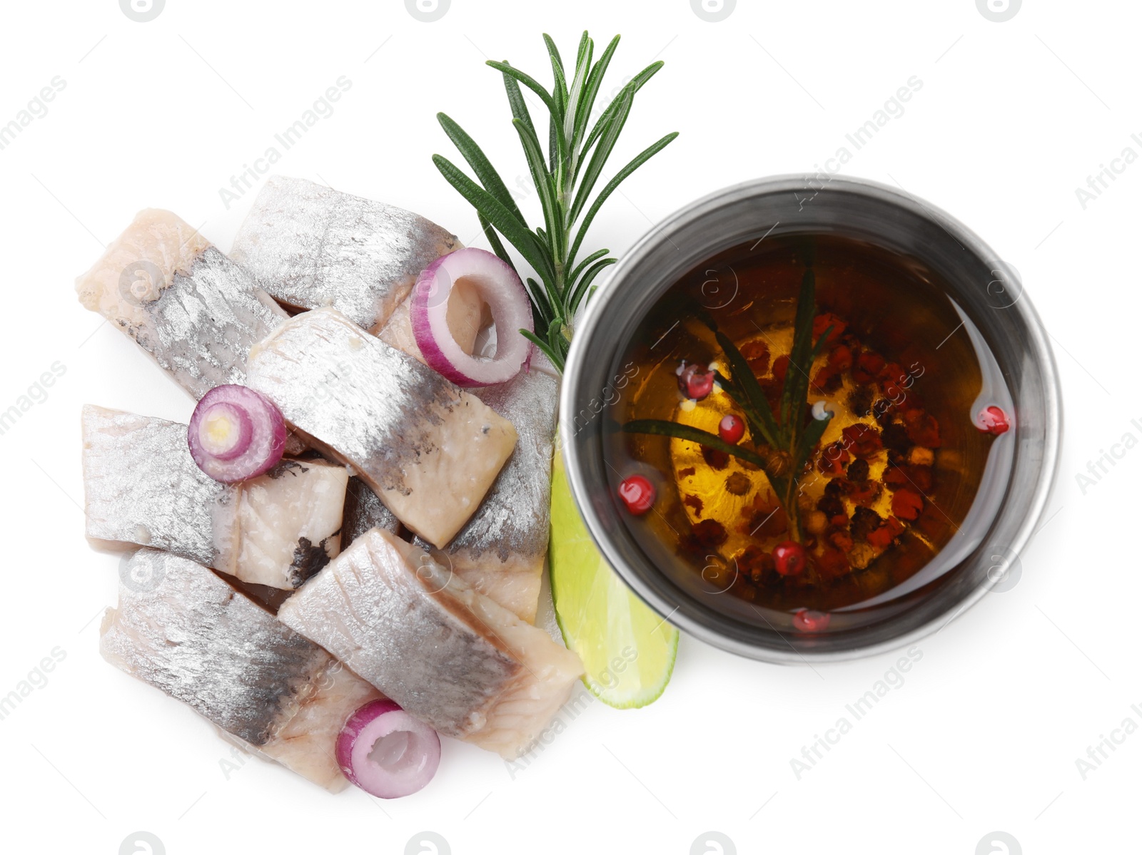 Photo of Pieces of tasty fish, onion and marinade isolated on white, top view