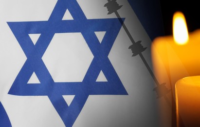 Image of Holocaust memory day. Double exposure with Flag of Israel and burning candle