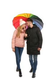 Full length portrait of beautiful couple with umbrella, isolated on white