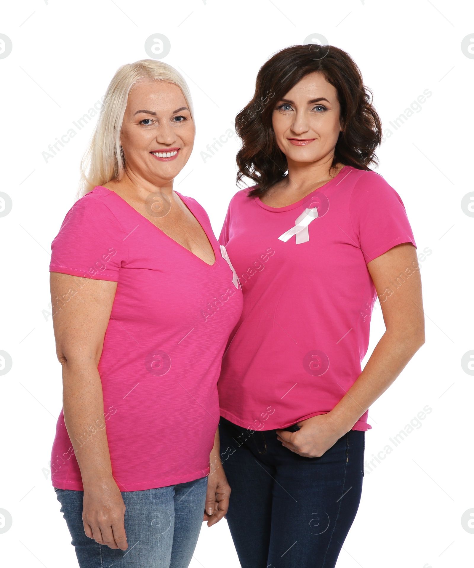 Photo of Women with silk ribbons on white background. Breast cancer awareness concept