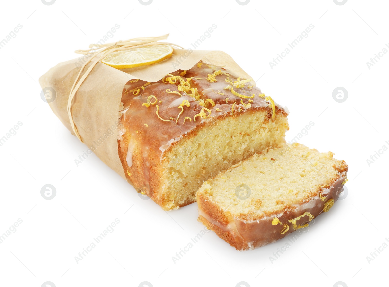 Photo of Wrapped tasty lemon cake with glaze isolated on white