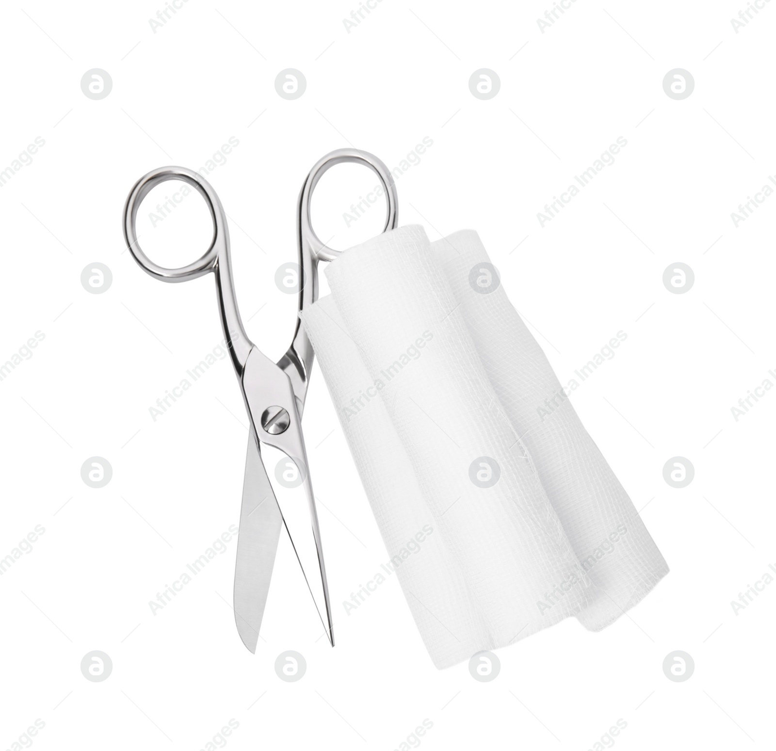 Photo of Medical bandage rolls and scissors on white background, top view