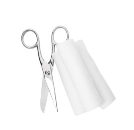 Photo of Medical bandage rolls and scissors on white background, top view